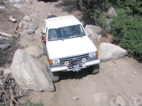 1989 Ford Bronco - This 1989 Ford Bronco is shown off-roading on a challenging rocky path.