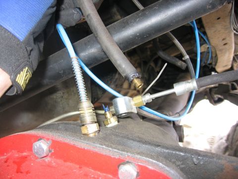 1989 Ford Bronco - Close-up of the rear differential and brake lines on a 1989 Ford Bronco.