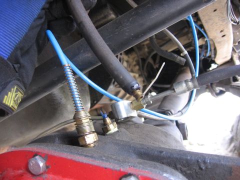 1989 Ford Bronco - Detail of air line and fittings, likely part of an off-road modification or repair.