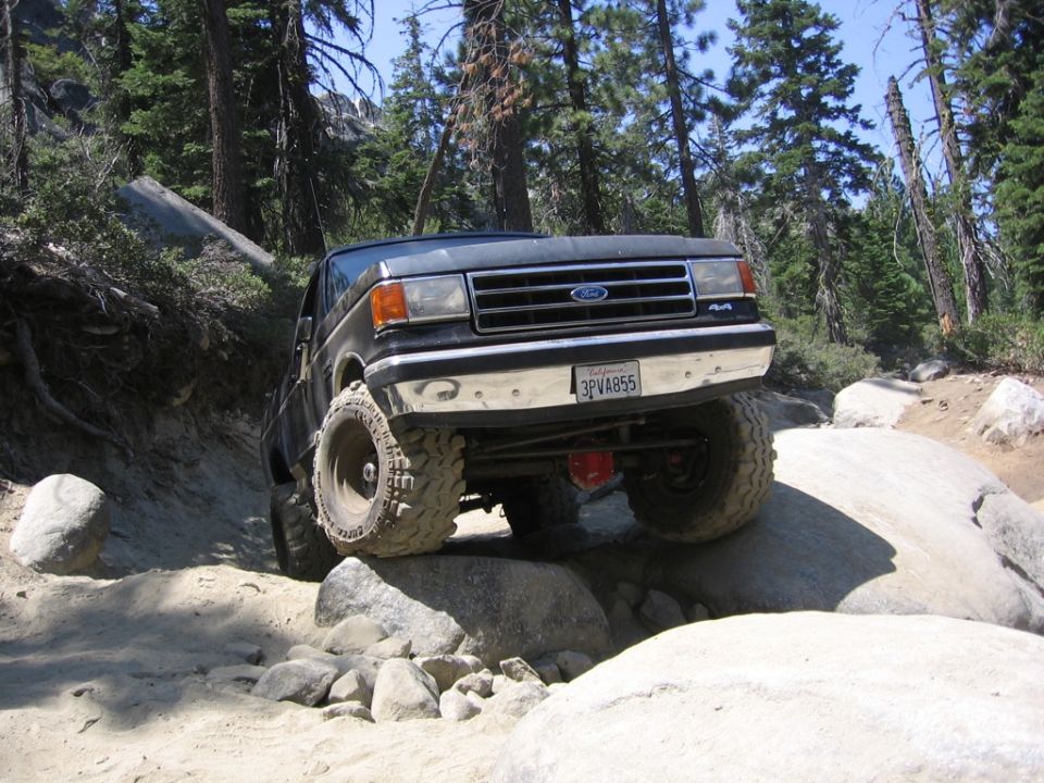 1989 Ford Bronco front view on rocky terrain