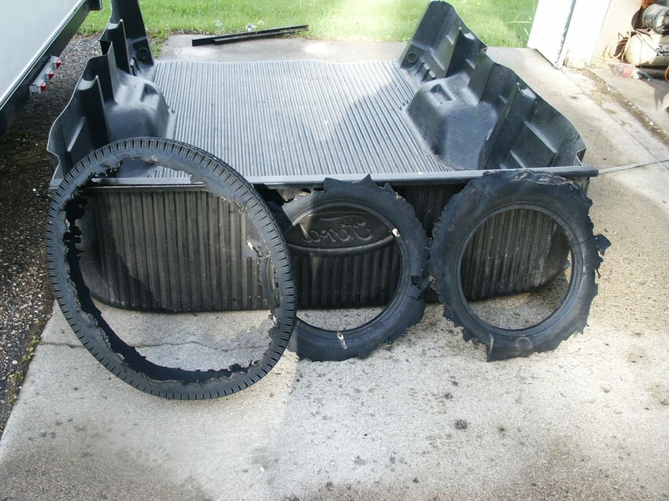 Damaged tires in truck bed