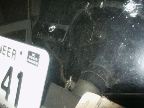 1966 Ford Bronco - Close-up of a license plate and interior components, not a 1966 Ford Bronco.