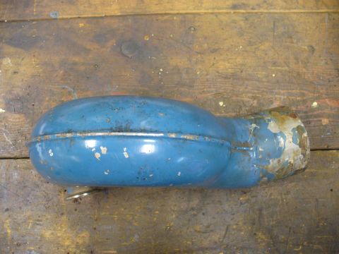 1978 Ford Bronco - This blue exhaust silencer shows signs of wear and tear, with chipped paint and rust.