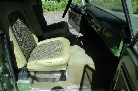 1973 Ford Bronco - Interior view of a 1973 Ford Bronco, highlighting the seats and dashboard.