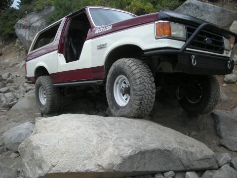 1991 Ford Bronco - This 1991 Ford Bronco navigates a rocky trail, its off-road capabilities.