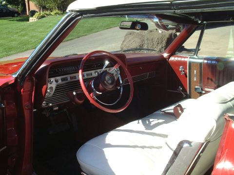 1967 Ford Galaxie - Interior view of a 1967 Ford Galaxie convertible, showing the dashboard and front seats.