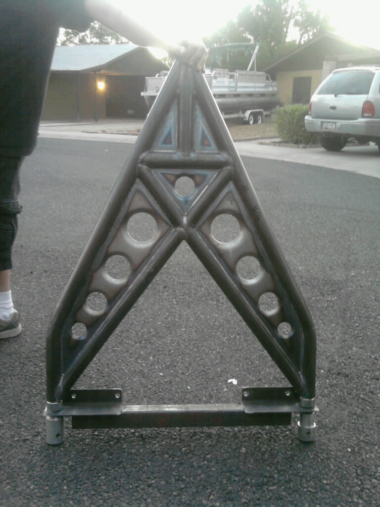 Custom metal A-frame part with circular cutouts