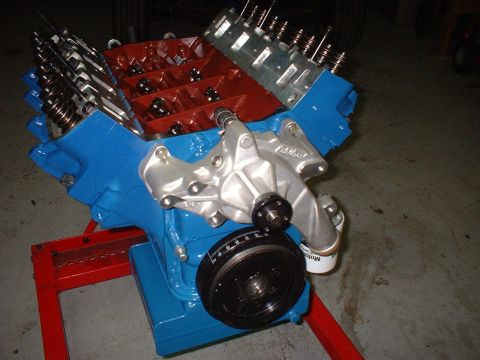 1968 Ford Galaxie - Ford V8 engine assembly on a stand, likely undergoing rebuild or modification.