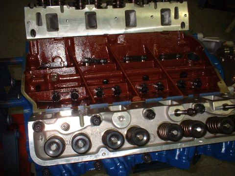 1968 Ford Galaxie - Close-up view of an engine block and cylinder heads, with visible valves and springs.