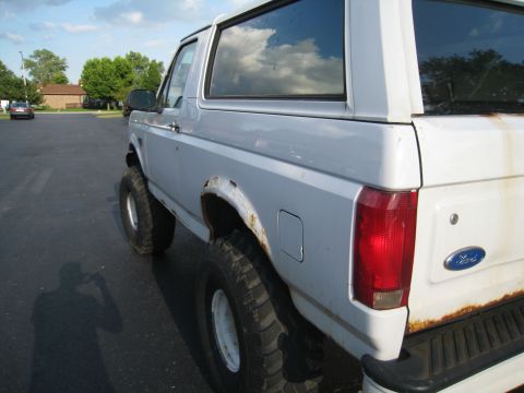 1996 Ford Bronco - This 1996 Ford Bronco has a lifted suspension and large off-road tires.