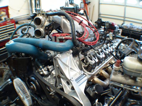 1996 Ford Bronco - Close-up of a Ford V8 engine, likely undergoing maintenance or rebuild.