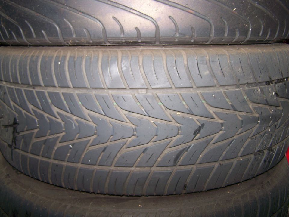 stack of used tires, close-up on tread pattern