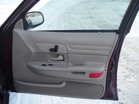 1999 Ford Crown Victoria - door mount 8-way power seat switch bezels in parchment. XW7Z-14528-ACA LH YW7Z-14527-AAA RH