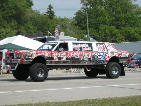 1988 Mercury Grand Marquis - This heavily modified limousine is covered in Detroit Red Wings memorabilia and features oversized tires.