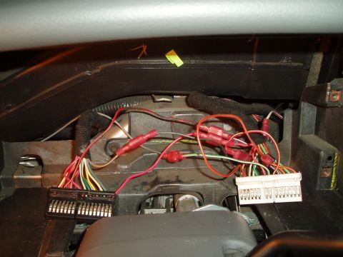 2003 Ford Crown Victoria - fully connected, notice tach wire coming up from the left, connected to the light green/white wire in the white connector and the white/red…
