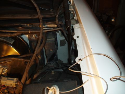 2003 Ford Crown Victoria - gray wire is the tach feed, installed through firewall into the marauder cluster ** through the rubber plug