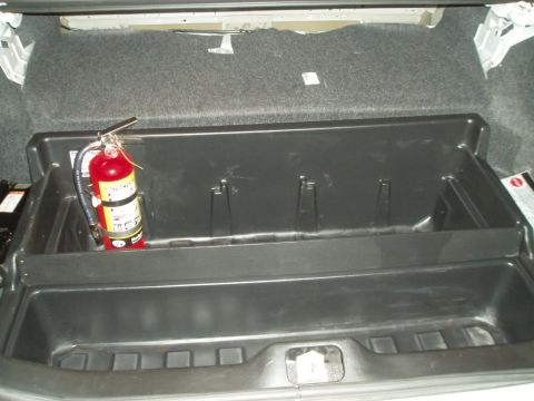 2003 Ford Crown Victoria - A close-up view of a car's interior, focusing on the dashboard area.
