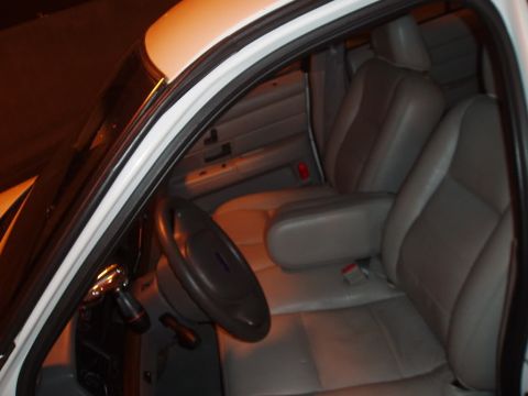 2003 Ford Crown Victoria - Interior view of a 2003 Ford Crown Victoria, focusing on the driver's area.