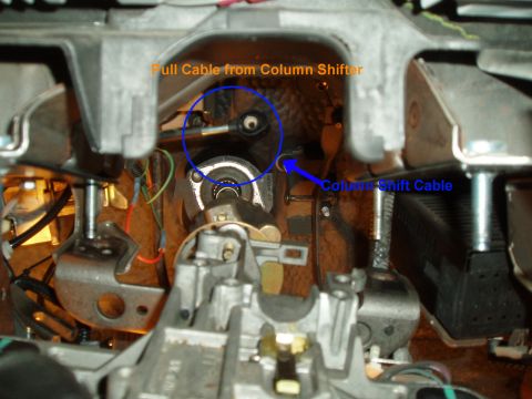 2003 Ford Crown Victoria - just pull the transmission cable off the column shifter, it won't get damaged, just pull stright back and hard.