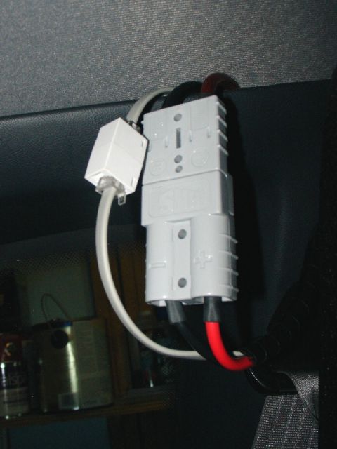 1993 Ford Mustang - An Anderson Powerpole connector is visible, wired with red and black cables, likely for auxiliary power.