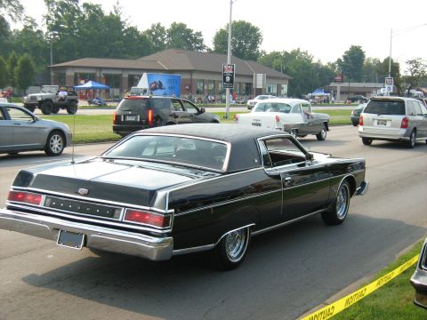 1988 Mercury Grand Marquis - A black 1978 Mercury sedan is seen from the rear at the Woodward Cruise 2009 event.