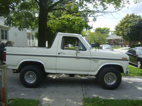 1985 Ford Bronco - This 1985 Ford Bronco is parked on a residential driveway.