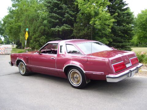 1979 Ford Thunderbird - This maroon coupe, likely a 1977 model, is shown from the rear 3/4 angle.