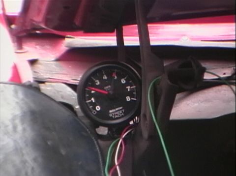 1967 Ford Galaxie - Autometer Street Tachometer gauge with red needle pointing to 2.