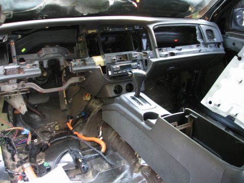 1999 Ford Crown Victoria - Interior of a 1999 Ford Crown Victoria with the dashboard disassembled for repair or modification.