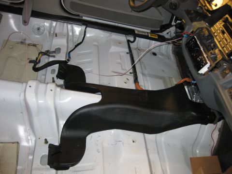 2003 Ford Crown Victoria - ** note this is the a/c duct that needs to be removed prior to installing floor shifter.