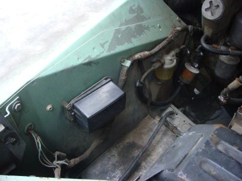 1967 Land Rover Land Rover - Engine bay components including a fuel filter and wiring harness are visible.