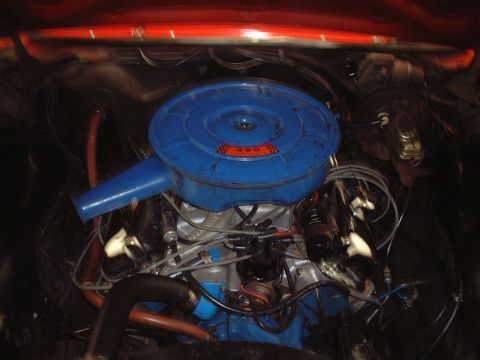 1967 Ford Galaxie - Engine bay detail showing a blue air cleaner with a '390' badge, consistent with a 1967 Ford Galaxie.