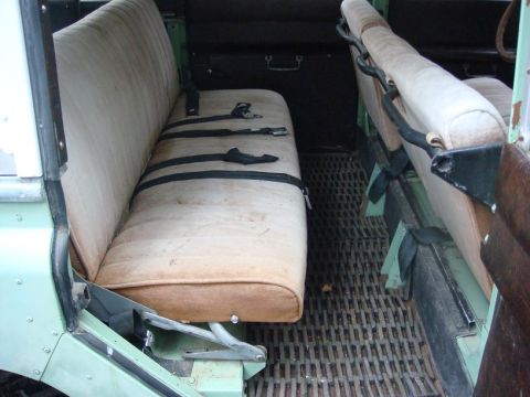 1967 Land Rover Land Rover - Interior of a 1967 Land Rover Land Rover, bench seats and seatbelts.