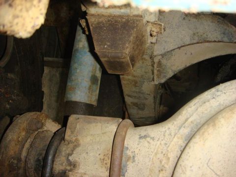 1967 Land Rover Land Rover - Close-up view of the rear axle and suspension components of a vehicle.