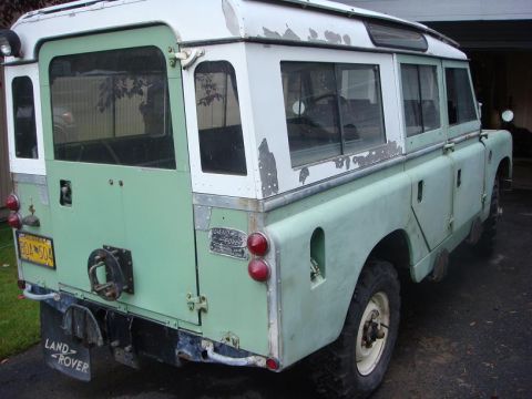 1967 Land Rover Land Rover - Rear view of a 1967 Land Rover showing its distinctive body shape and rear-mounted spare tire carrier.