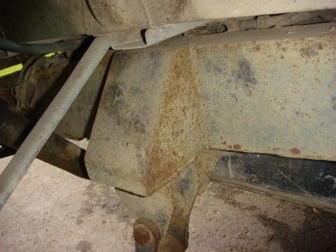 1967 Land Rover Land Rover - The chassis frame of a vehicle shows significant rust and wear, with visible suspension components.