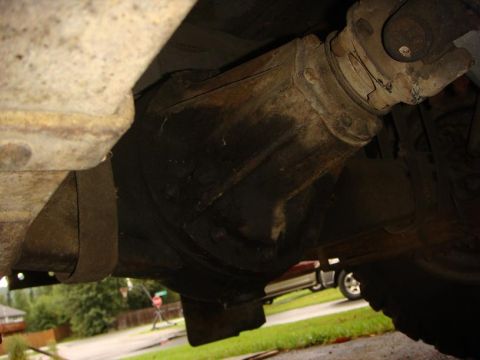 1967 Land Rover Land Rover - Underside view of a vehicle's driveshaft and differential housing.