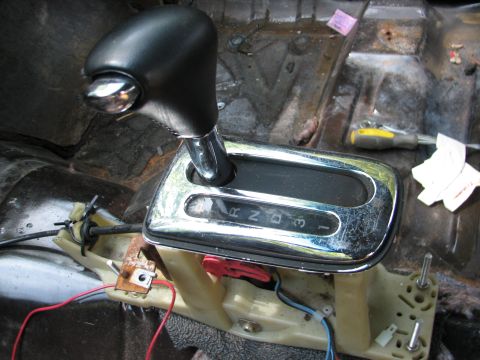 1999 Ford Crown Victoria - Automatic transmission shifter assembly removed from a vehicle's interior.