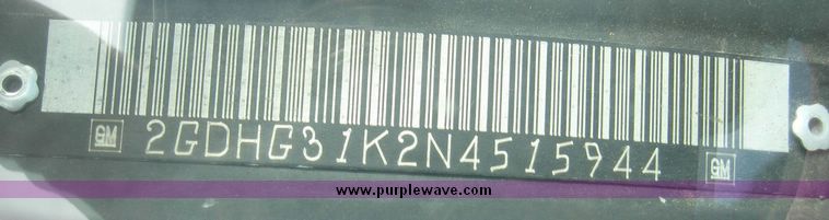 VIN plate with barcode and GM logo