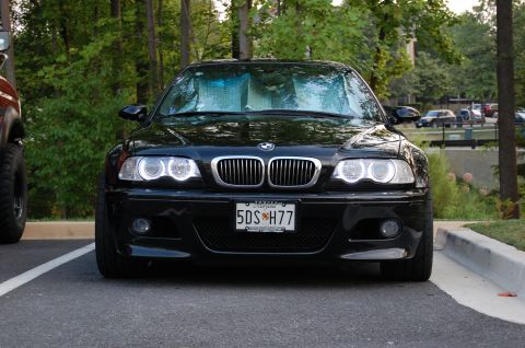2002 BMW M3 - Front view of a black 2002 BMW M3 parked outdoors, showing its distinctive grille and headlights.