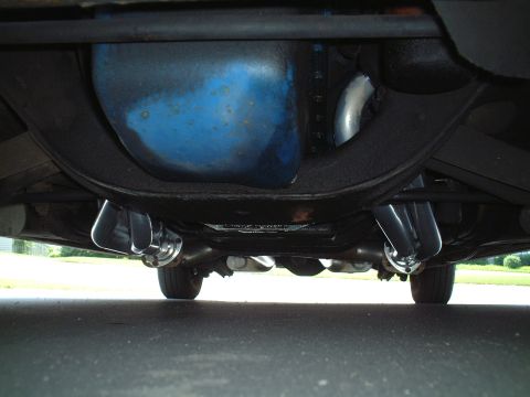 1967 Ford Galaxie - Underbody view of a vehicle, focusing on the exhaust headers and oil pan.