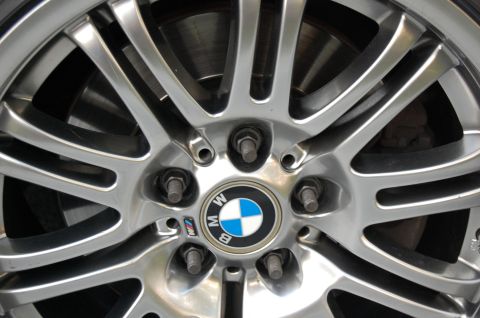 2002 BMW M3 - Close-up of a BMW alloy wheel with M badge visible on the center cap.