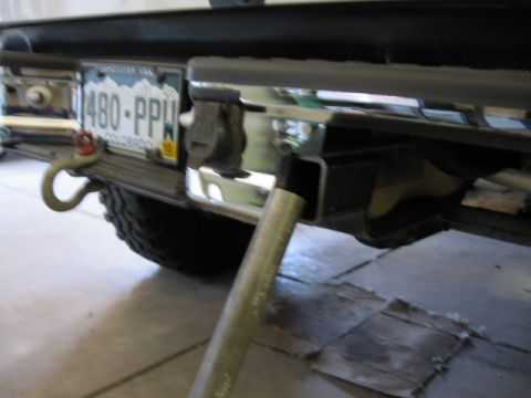 1995 Ford Bronco - Rear view of a 1995 Ford Bronco showing the bumper, license plate, and tow hitch.