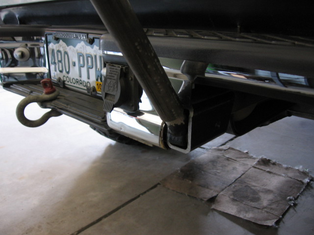Rear hitch and tow hook under vehicle with Colorado plate 480-PPW