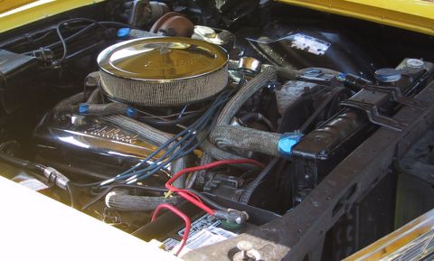 1967 Ford Galaxie - Close-up view of a car's engine bay, showing various components and wiring.
