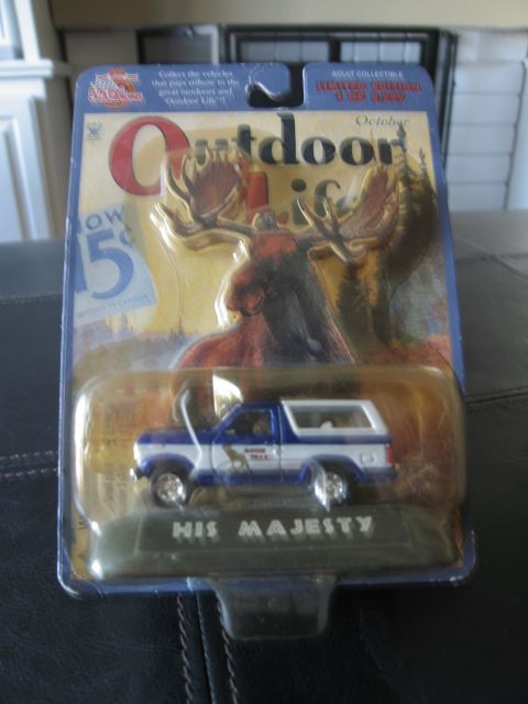 1986 Ford Bronco - Diecast 1986 Ford Bronco model, part of an 'Outdoor Life' collectible series.