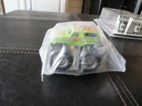 1986 Ford Bronco - A toy monster truck is shown inside its original packaging.