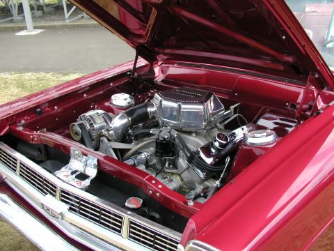 1967 Ford Ranchero - Engine bay of a 1967 Ford Ranchero, a supercharged V8 and custom chrome components.
