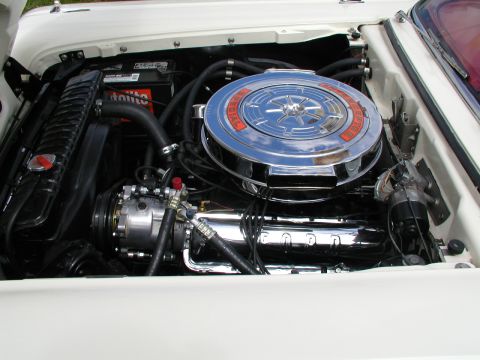1967 Ford Ranchero - Close-up of a Ford V8 engine, likely from the mid-1960s, showing chrome details.