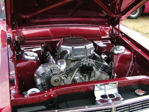 1967 Ford Ranchero - Close-up of a custom V8 engine bay with polished chrome components and a turbocharger.